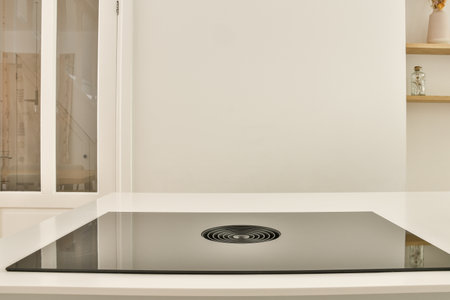 a white bathroom with a sink and mirror in the corner, as seen from the bottom down to the floorの写真素材