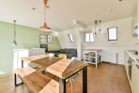 A beautifully designed interior featuring minimalist furniture, natural light flooding the room, and...