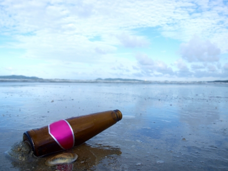 Bottle on the beachの写真素材