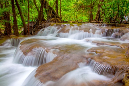  Waterfall in deep rain forest jungle. (Huay Mae Kamin Waterfall in Kanchanaburi Province, Thailand)