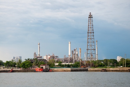 Oil refinery factory at river in  Bangkok Thailand.
