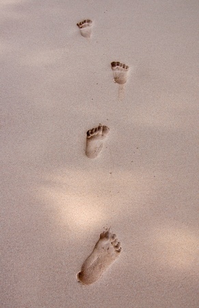 human footprints on the beach sand.の写真素材