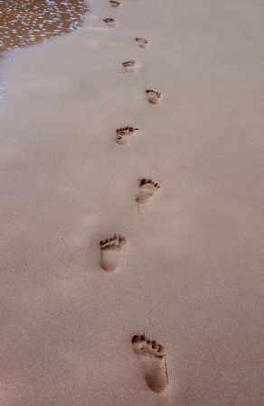 human footprints on the beach sand.の写真素材