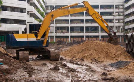Excavator construction equipment park at worksite.