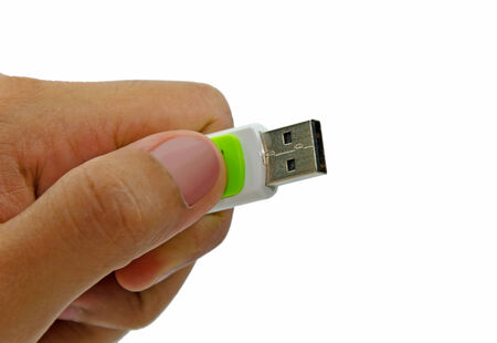 Flash drive on hand holding.の写真素材