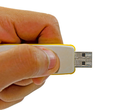 Flash drive on hand holding.