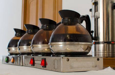 Coffee or tea in kettle boiler pot for conference break.の写真素材