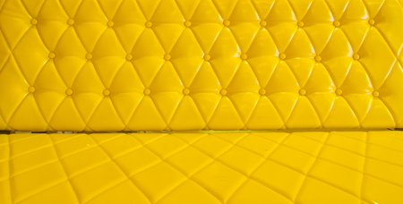 yellow sofa upholstery leather pattern .の写真素材