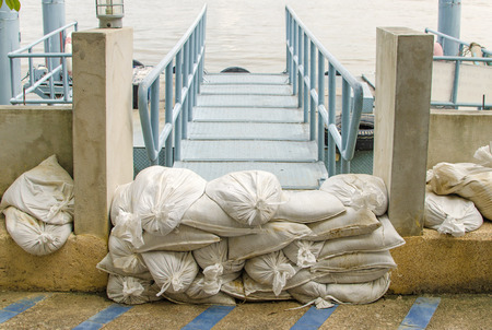 White sandbags for flood defense.の写真素材