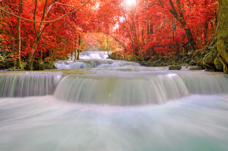 Waterfall in deep rain forest jungle (Huay Mae Kamin Waterfall in Kanchanaburi Province, Thailand)