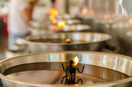 Burning candles in temple.の写真素材