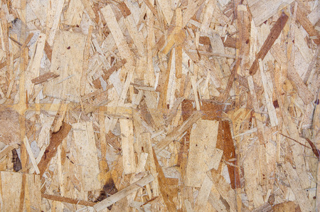Plywood particle board for background.