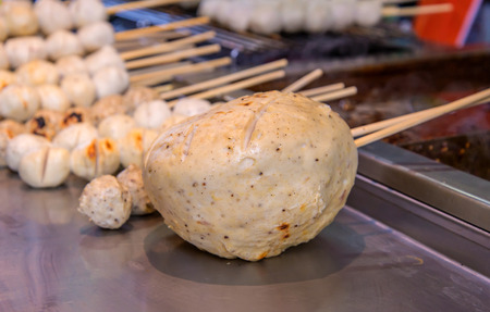 Grilled big meatball fast food in market Thailandの写真素材