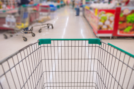 Closeup of trolley for shopping at supermarket.の写真素材