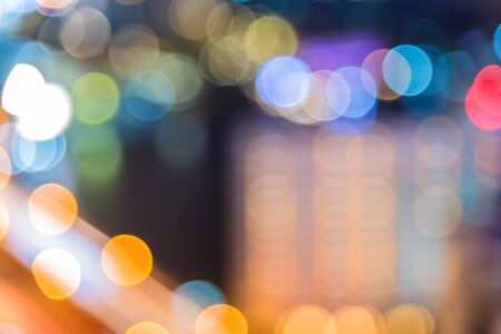 Abstract circular of Light cars bokeh in city at nightの写真素材