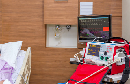 Defibrillator in ICU room at hospital with medical equipments.の写真素材