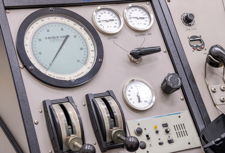 Control panel in a cockpit with instruments equipment.