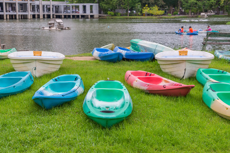 Canoe on a lake at in garden at public park.の写真素材