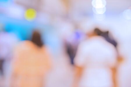 blur of People Walking in business center.の写真素材