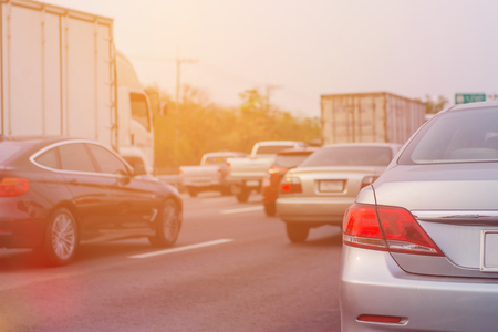 traffic jam with rows of cars during rush hour on road.の写真素材