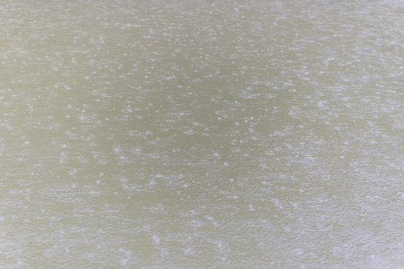 Rain drops in water on the lake.の写真素材