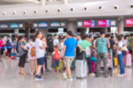 blurred of Traveler Check in at airport terminal.