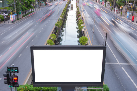 billboard blank on road with city view background for advertising.の写真素材