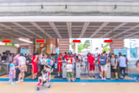 blur people at queue in front of exhibition gate, abstract blurred background.のeditorial素材