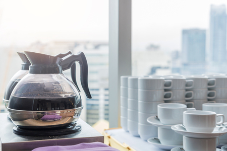 Coffee or tea in kettle boiler pot for conference break.の写真素材