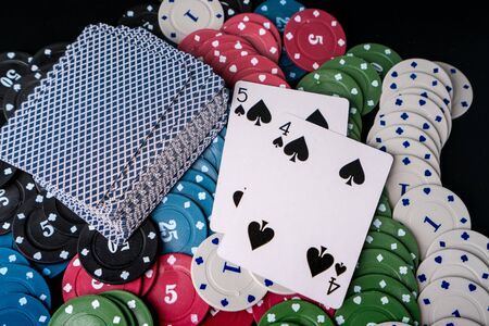 pokdeng or poker witht Chips and card for casino or pile of gambling tokens. Volumetric heap of...