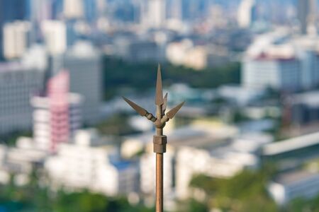 Lightning rod or lightning conductor on the roof of building for protection high voltage from...
