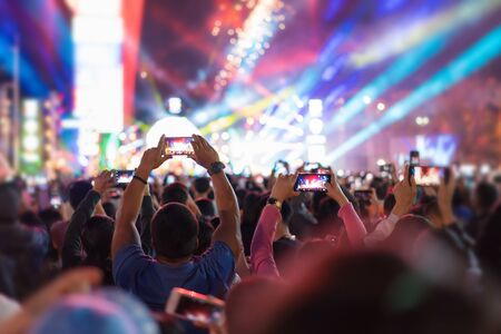 music brand showing on stage or Concert Live and Defocused entertainment concert lighting on stage with Laser rays beams, party conceptの写真素材