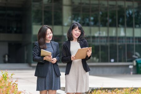business woman working together with tablet at office building.の写真素材