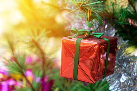 Luxury New Year gift box and Christmas gift boxed with bow ribbon in Christmas backgroundの写真素材