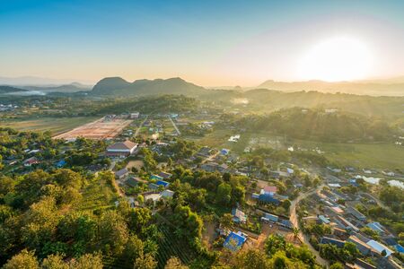 beautiful village in the mountains view of sunrise over little town, gorgeous landscape traveling...