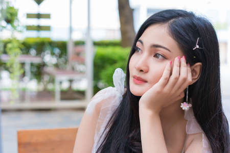 Portrait of beautiful Asian woman smile relaxing, Lifestyle relax concept.の写真素材