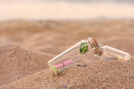 Message or letter in bottle on the tropical beach.の写真素材