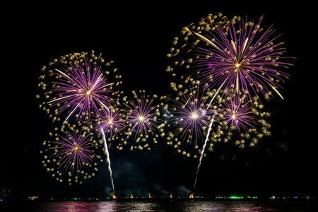 Colorful fireworks of various colors at night with celebration and anniversary concept.