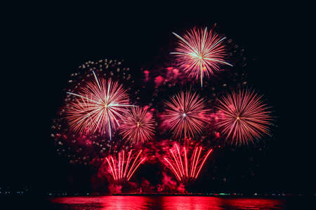 Colorful fireworks of various colors at night with celebration and anniversary concept.の写真素材