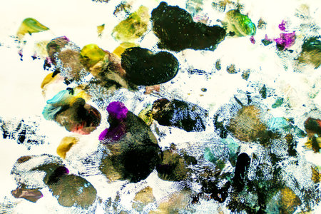 Splash watercolors drops on white background. Abstract colorful for background.の写真素材