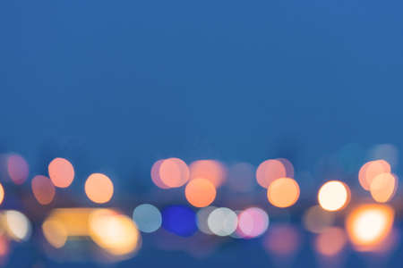 Abstract circular bokeh of cityscape at twilight time.の写真素材