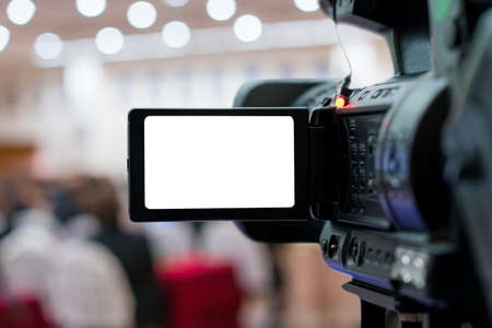 video camera in business conference room recording participants and speaker, seminar meeting, event and seminar concept.の写真素材
