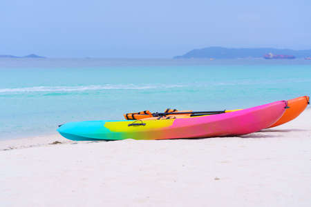 sea kayaks or multicolor boat on beautiful beach in Thailand.の写真素材