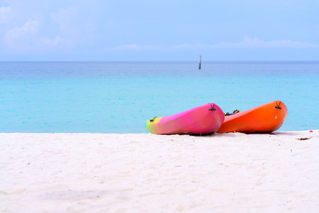 sea kayaks or multicolor boat on beautiful beach in Thailand.の写真素材