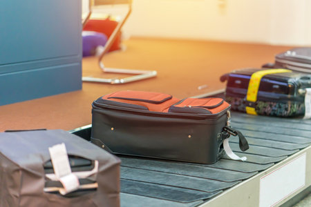 Suitcase or luggage with conveyor belt in the airport.の写真素材
