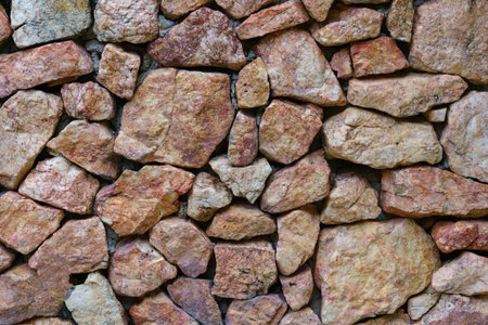 Background of stone wall texture abstract for design.の写真素材