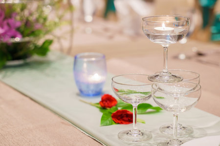 Elegance of glasses on table set up for dinning room.の写真素材