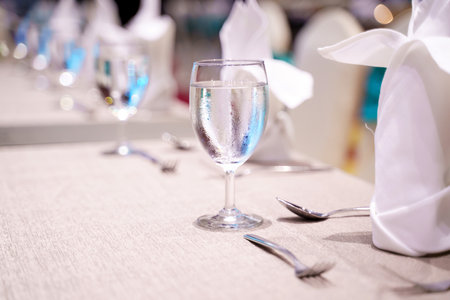 Elegance of glasses on table set up for dinning room.の写真素材