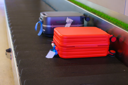 Suitcase or luggage with conveyor belt in the airport.の写真素材