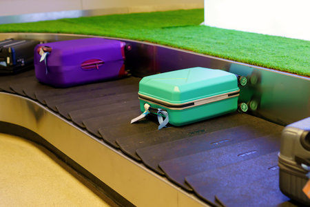 Suitcase or luggage with conveyor belt in the airport.の写真素材